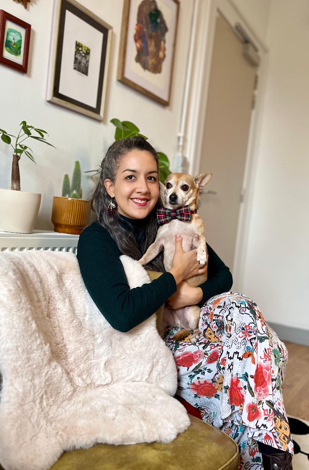 Art therapist Camila with therapy dog Diego at Wild Goat Creative Studio